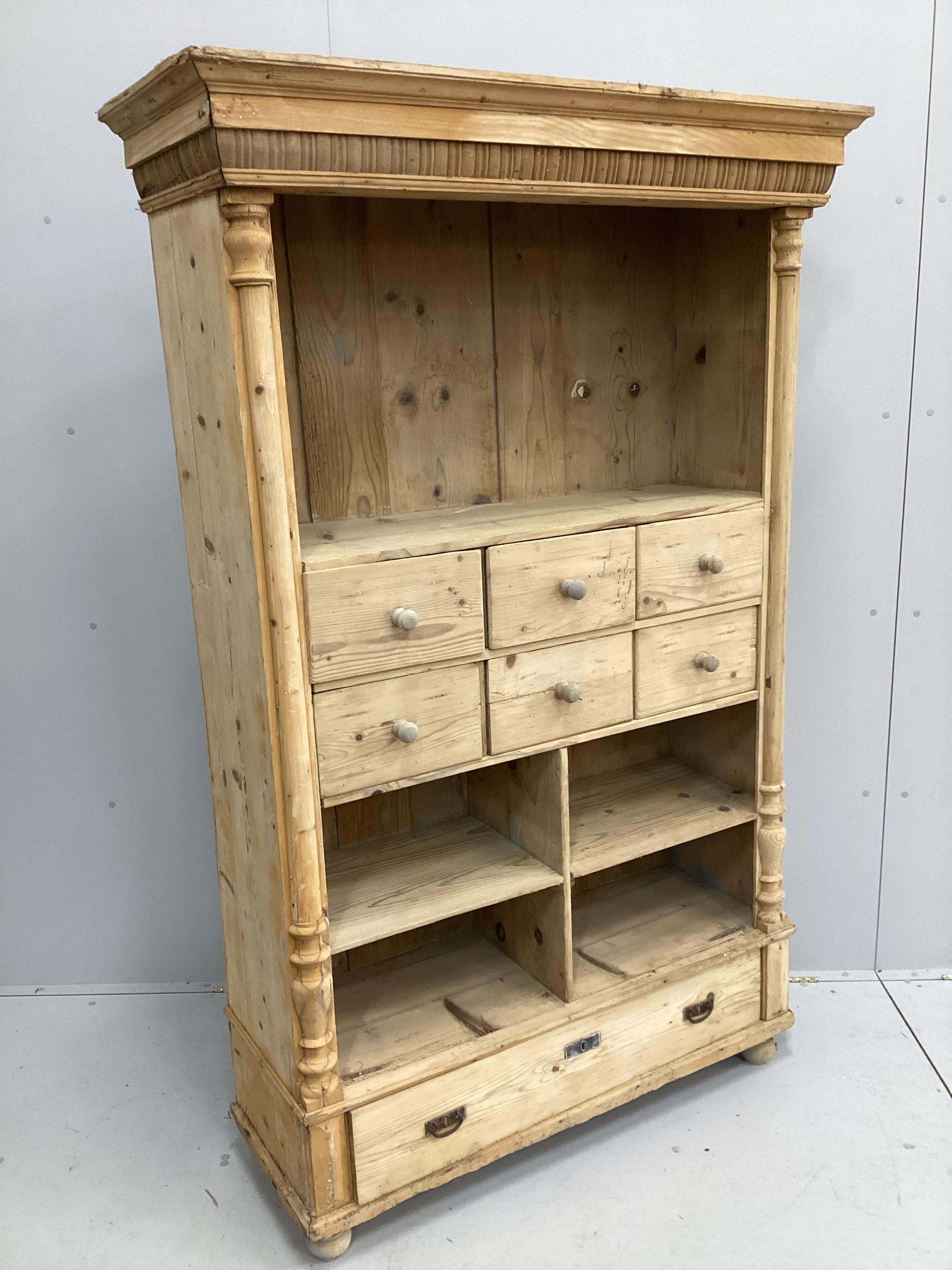 A 19th century East European pine kitchen cabinet, width 120cm, depth 44cm, height 187cm